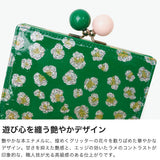 ツモリチサト 二つ折り財布 レディース ブランド tsumori chisato CARRY 財布 がま口 本革 革 大人 かわいい 二つ折 カード入れ 小銭入れ 牛革 日本製 エナメル グリッターフラワー ガマ札入れ 57854