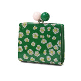 ツモリチサト 二つ折り財布 レディース ブランド tsumori chisato CARRY 財布 がま口 本革 革 大人 かわいい 二つ折 小銭入れ ミニ財布 牛革 日本製 エナメル グリッターフラワー がま口ミニ財布 57856