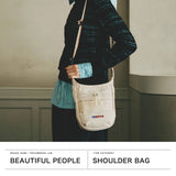 ビューティフルピープル ショルダーバッグ レディース メンズ beautiful people バッグ 斜めがけ ブランド 小さめ 大人 軽量 ミニ ショルダー コットン BRIEFING×beautifulpeople BRIEFING CANVAS DAY TRIPPER SLIM 1646612000