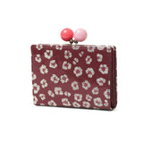ツモリチサト 二つ折り財布 レディース ブランド tsumori chisato CARRY 財布 がま口 本革 革 大人 かわいい 二つ折 カード入れ 小銭入れ 牛革 日本製 エナメル グリッターフラワー ガマ札入れ 57854