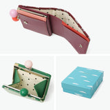 ツモリチサト 二つ折り財布 レディース ブランド tsumori chisato CARRY 財布 がま口 本革 革 大人 かわいい 二つ折 小銭入れ ミニ財布 牛革 日本製 エナメル グリッターフラワー がま口ミニ財布 57856